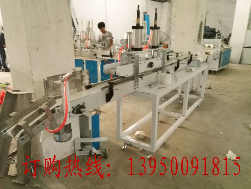 壓扁紙包裝機(jī)  實(shí)心壓扁衛(wèi)生紙中圖片