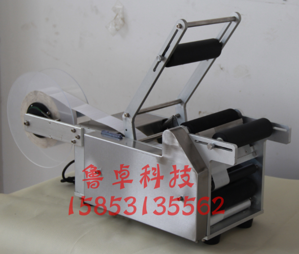 半自動(dòng)貼標(biāo)機(jī)圖片/半自動(dòng)貼標(biāo)機(jī)樣板圖 (3)