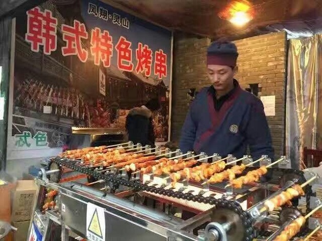 全自動(dòng)無(wú)煙環(huán)保過(guò)山車式燒烤機(jī)圖片