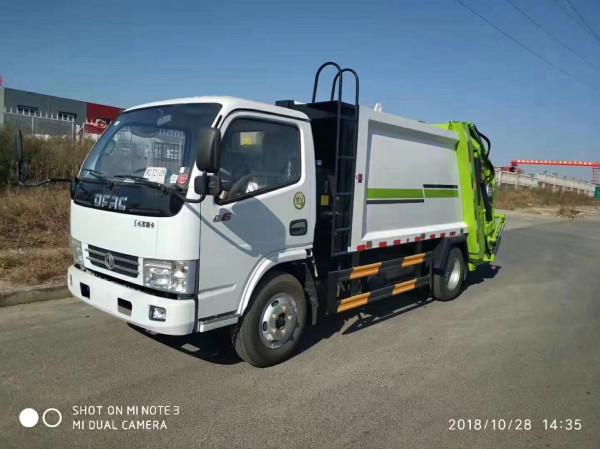 廠家供應東風多利卡六方壓縮垃圾車報價多少？