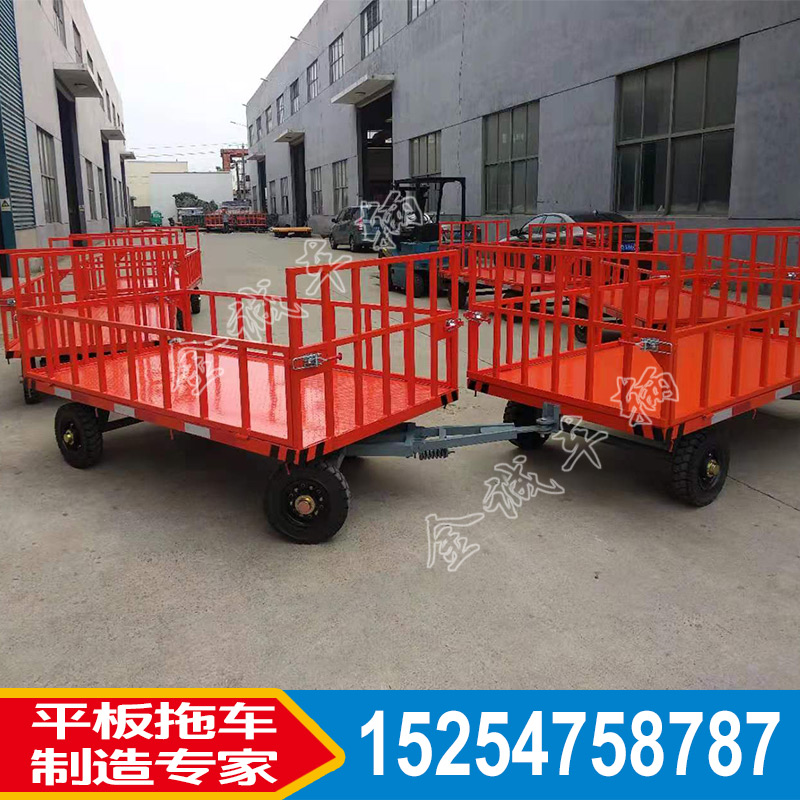 廠區(qū)圍欄式平板拖車 場(chǎng)內(nèi)周轉(zhuǎn)貨物帶轉(zhuǎn)向的平板車山東廠家非標(biāo)定制