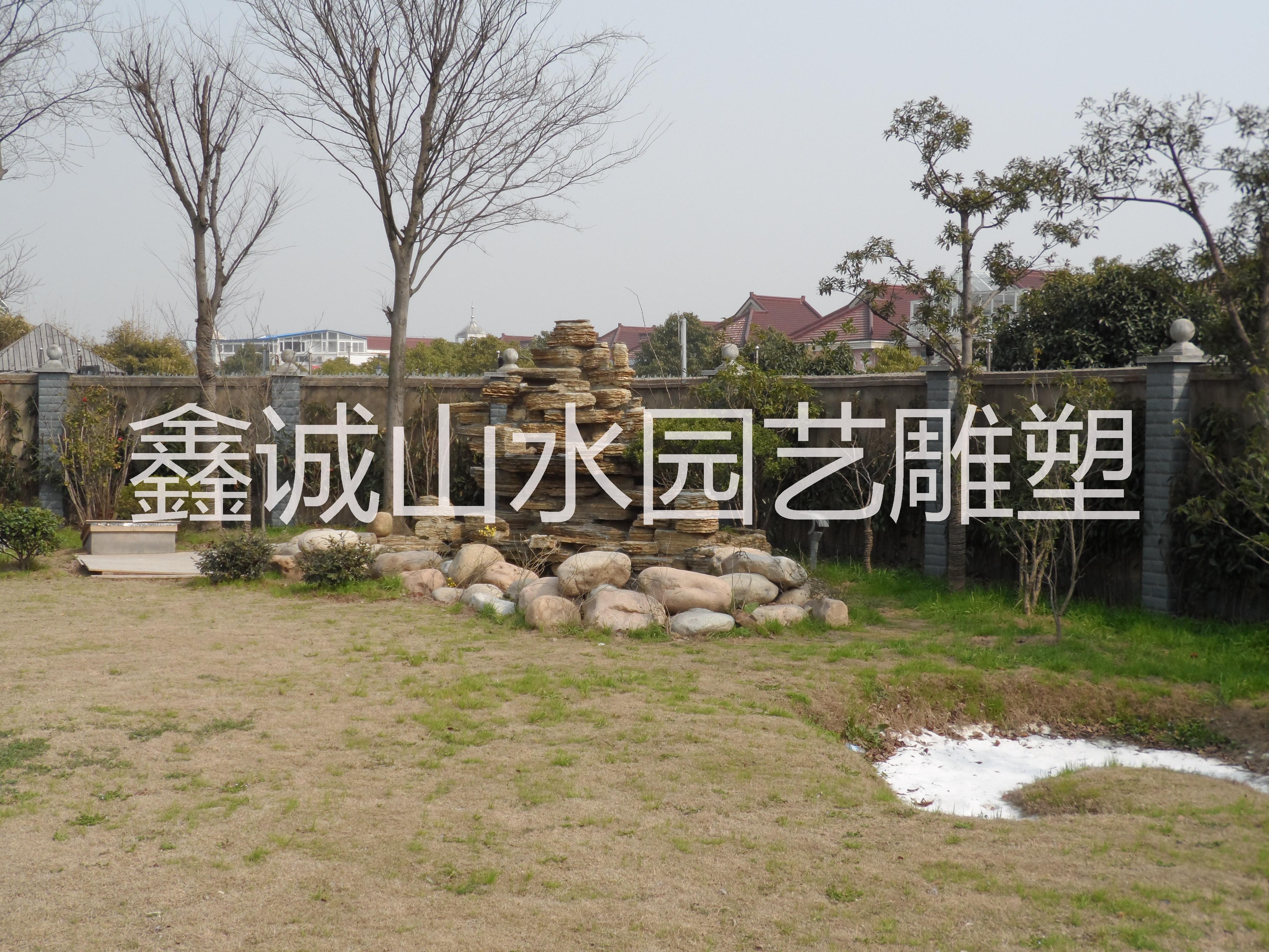 供應(yīng)用于園林的千層石及千層石假山，千層石湖岸