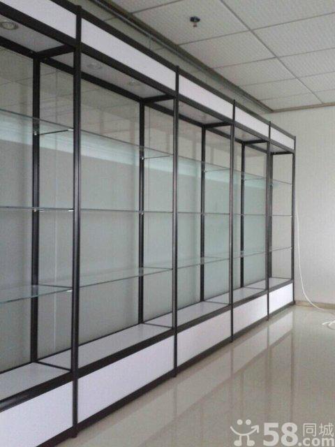 供應(yīng)用于展示商品的君誠展柜雕花金黃鈦合金展柜