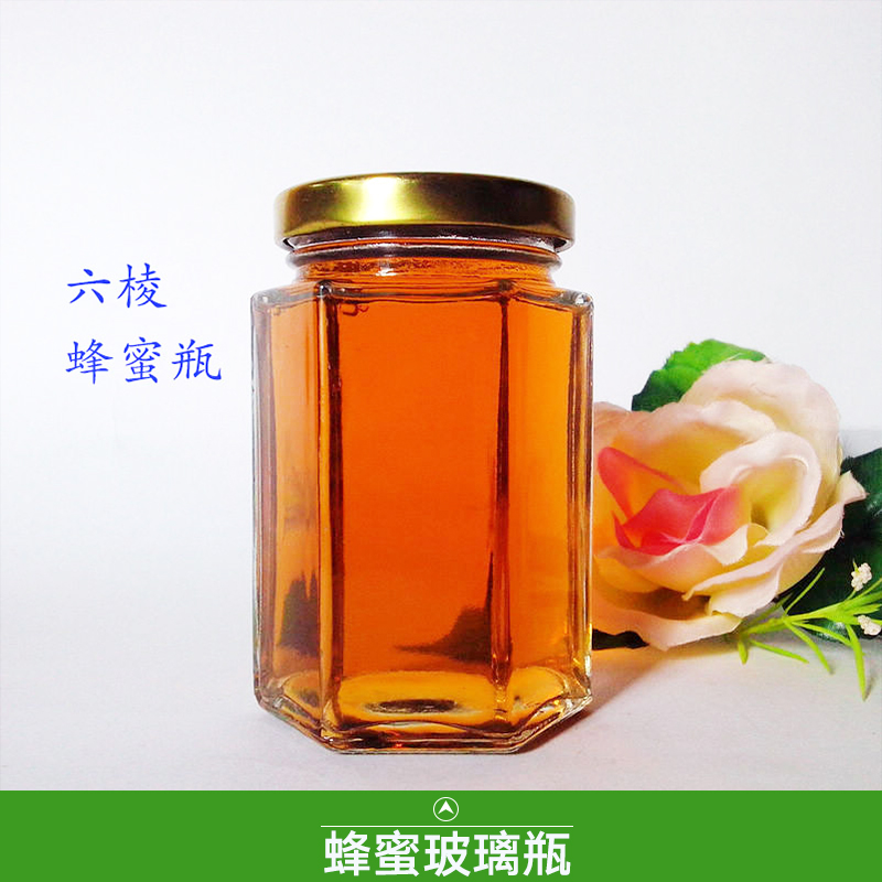 徐州三江玻璃制品供應(yīng)蜂蜜玻璃瓶、六棱透明蜂蜜玻璃瓶 食品包裝玻璃瓶