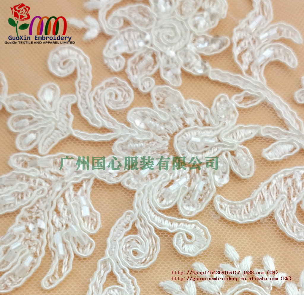 釘珠蕾絲面料婚紗禮服  廠家批發(fā) 釘珠蕾絲面料婚紗禮服 服裝服飾輔料