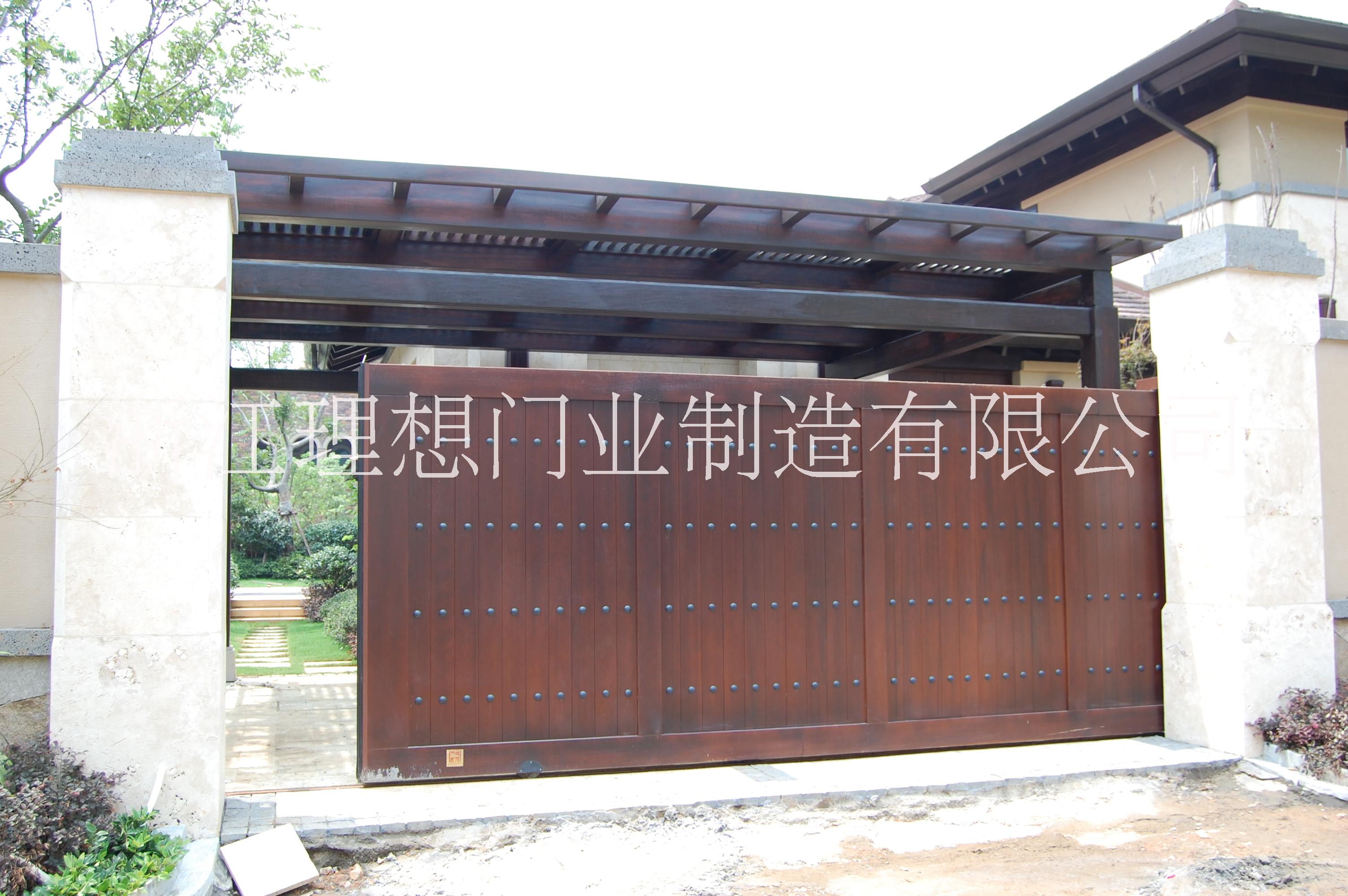 供應(yīng)實(shí)木車庫門別墅實(shí)木車庫門 實(shí)木車庫門別墅實(shí)木庭院平移門