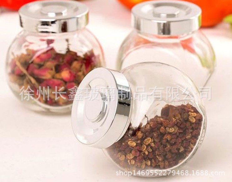 廠家直銷扁鼓玻璃儲物罐喜糖糖果瓶花茶密封瓶玻璃蜂蜜瓶調味瓶
