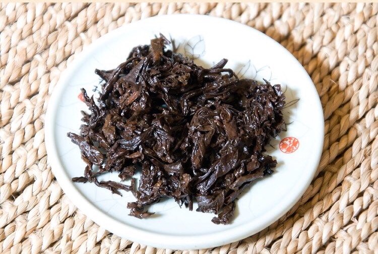 天弘茶業(yè) 老曼娥09年普洱熟茶 手工石磨壓制