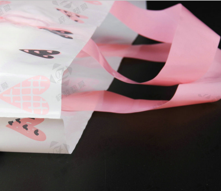 廠家批發(fā) 愛心通用包裝手提袋 日用品塑料手提袋 服飾包裝禮品袋 塑料禮品包裝袋