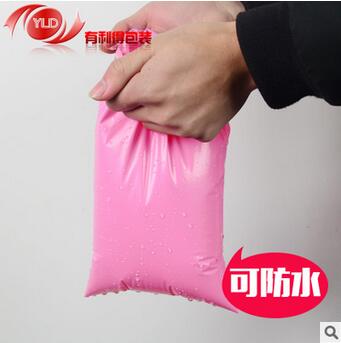 新料快遞袋批發(fā)加厚粉色彩色郵政物流禮品包裝袋子17*30定制