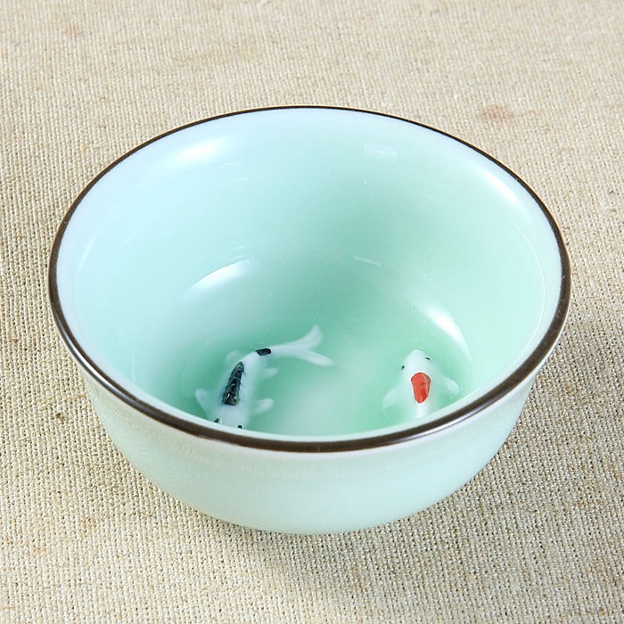 創(chuàng)意陶瓷青瓷功夫茶具普洱茶杯水杯品茗杯浮雕鯉魚品茗杯