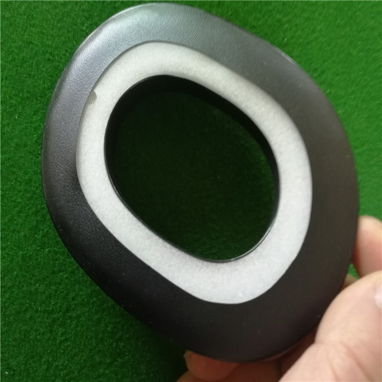 廠家直銷環(huán)保PVC吸塑皮耳套價格/熱壓成型耳機海綿皮耳套報價