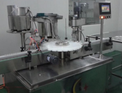 小劑量灌裝機打內(nèi)塞旋外蓋一體機