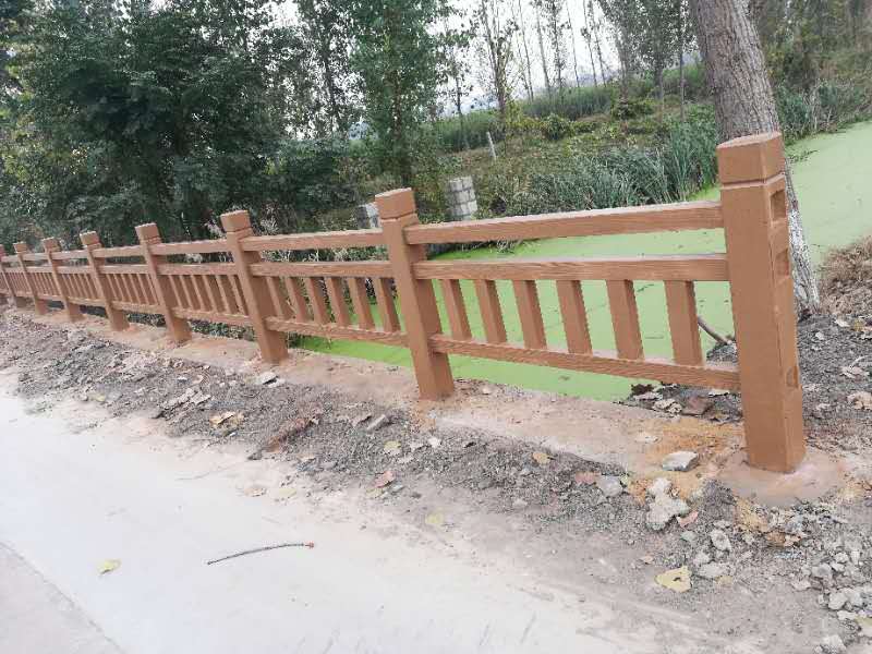 河道護(hù)欄廠家定做水泥仿樹皮欄桿 仿木護(hù)欄外觀美觀質(zhì)量保障優(yōu)惠