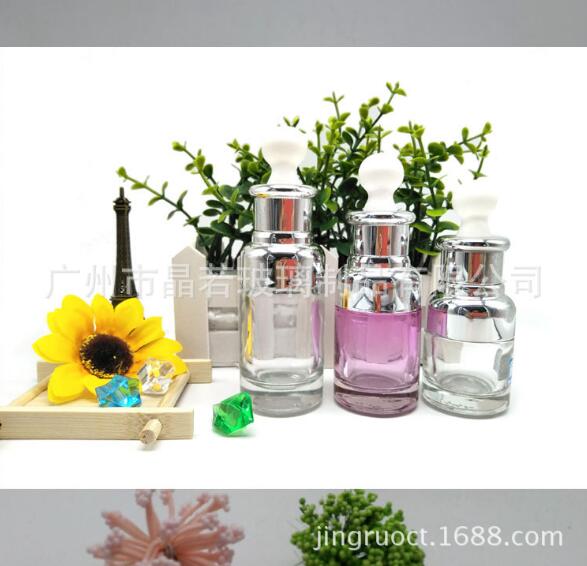 廠家直銷 現(xiàn)貨供應(yīng) 電化鋁套肩瓶 原液瓶 精油瓶肩套玻璃瓶