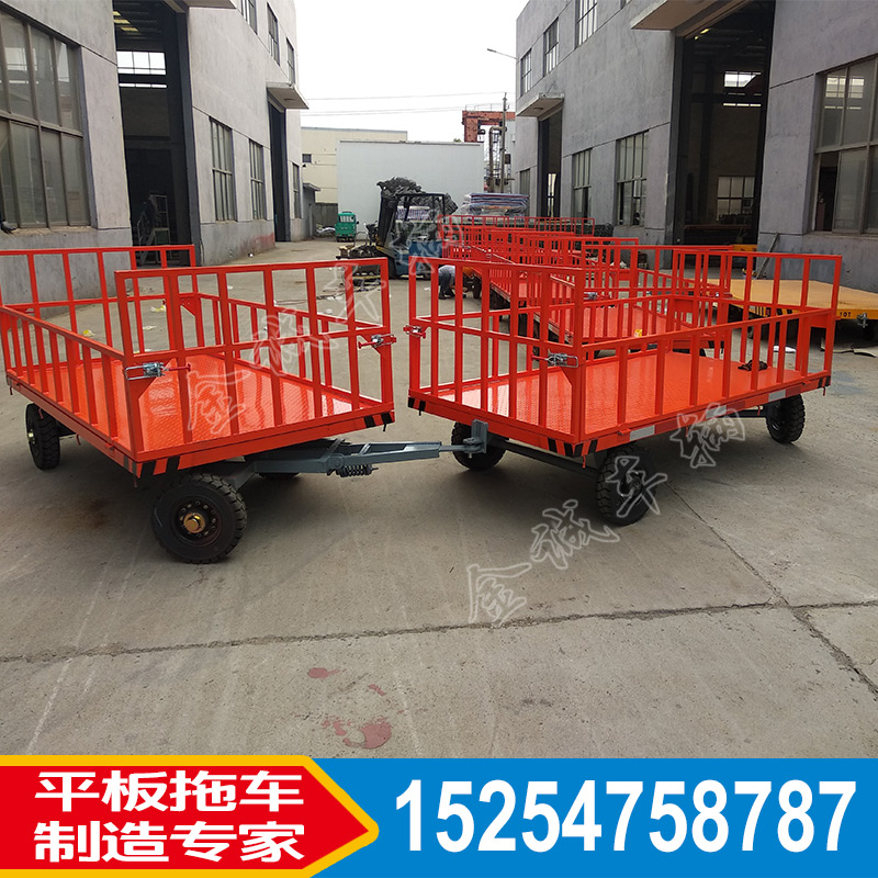 廠區(qū)圍欄式平板拖車 場(chǎng)內(nèi)周轉(zhuǎn)貨物帶轉(zhuǎn)向的平板車山東廠家非標(biāo)定制