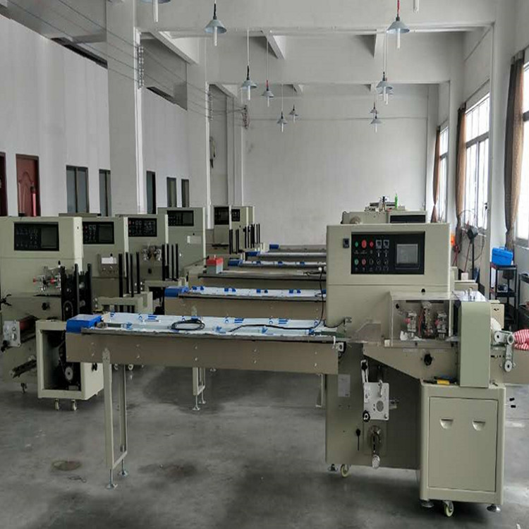 佛山全自動(dòng)一次性PE薄膜手套包機(jī) 一次性PE手套自動(dòng)包裝設(shè)備