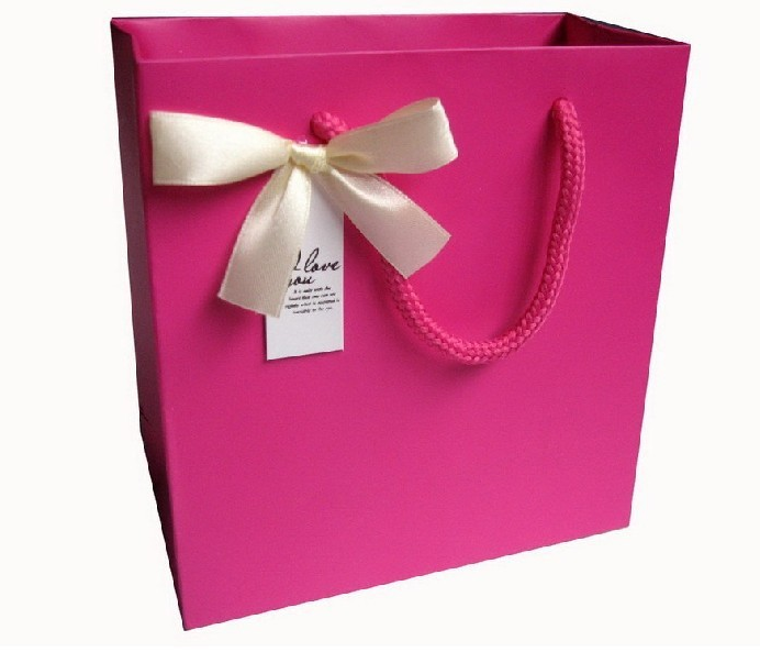 批發(fā)供應服裝手提紙袋 環(huán)保牛皮紙方底手提紙袋 禮品紙袋