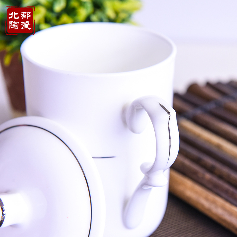 骨瓷蓋杯唐山北都陶瓷批發(fā)辦公室茶水杯禮品杯 現(xiàn)代簡約骨瓷蓋杯馬克杯會議杯