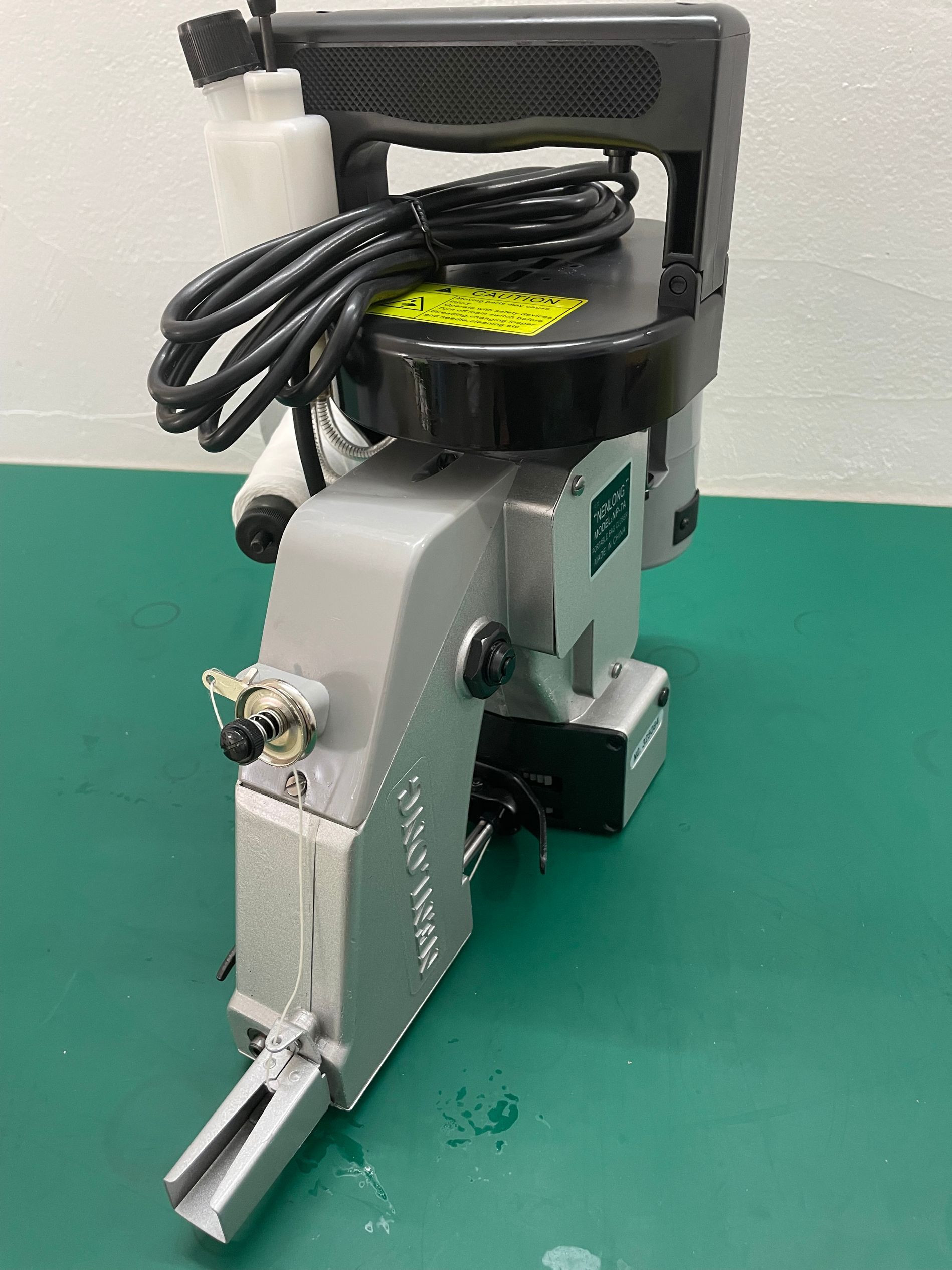 NP-7A縫包機(jī)國產(chǎn)鈕朗包封機(jī)厚料機(jī)