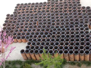 煙臺(tái) 鑄石板管_鋼廠耐高溫鑄石管排渣管排渣溝鑄石板供應(yīng)商