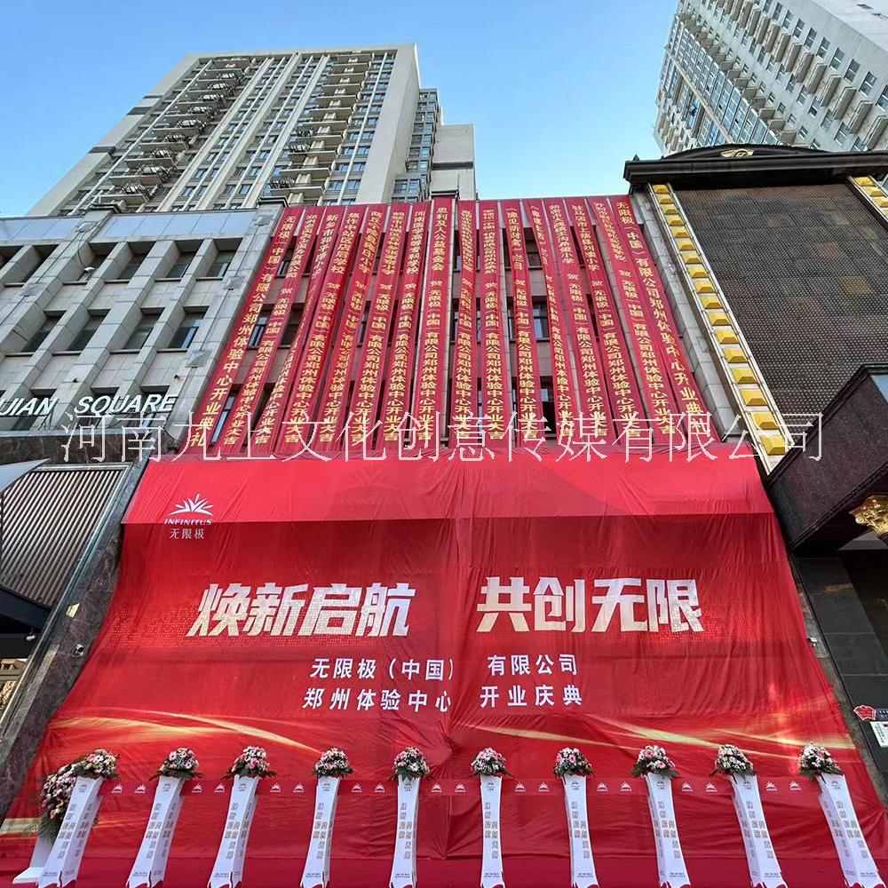河南漯河開業(yè)儀式啟動(dòng)道具電動(dòng)對(duì)開揭幕 剪彩花柱 手印柱出租